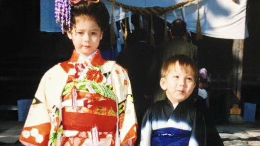 Mixed Half Children in Kimono in front of a shinto shrine in Iwaki city, Fukushima Japan. Mixed bi-racial artist now creates pottery in Brisbane Australia.