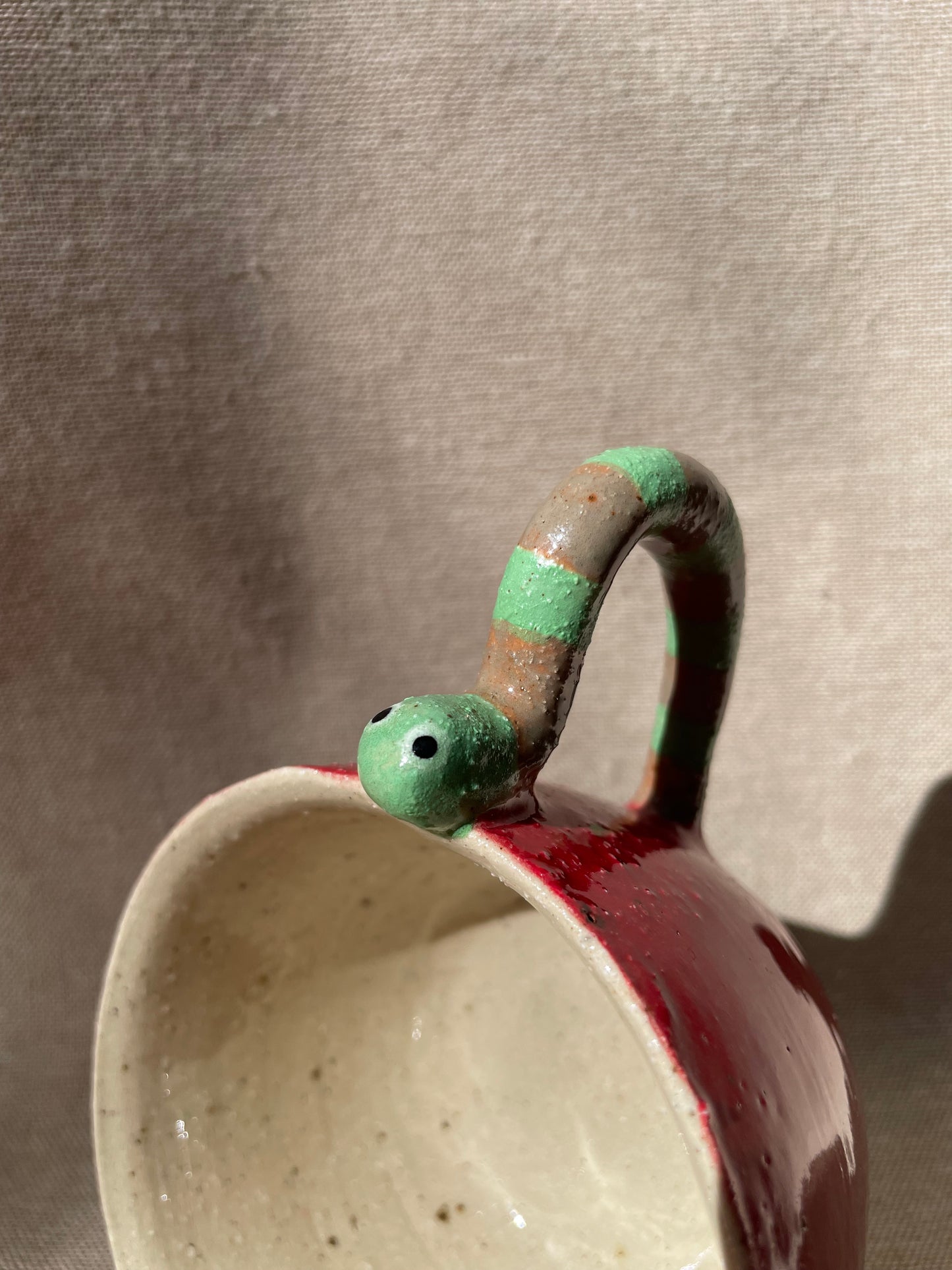snacking caterpillar mug